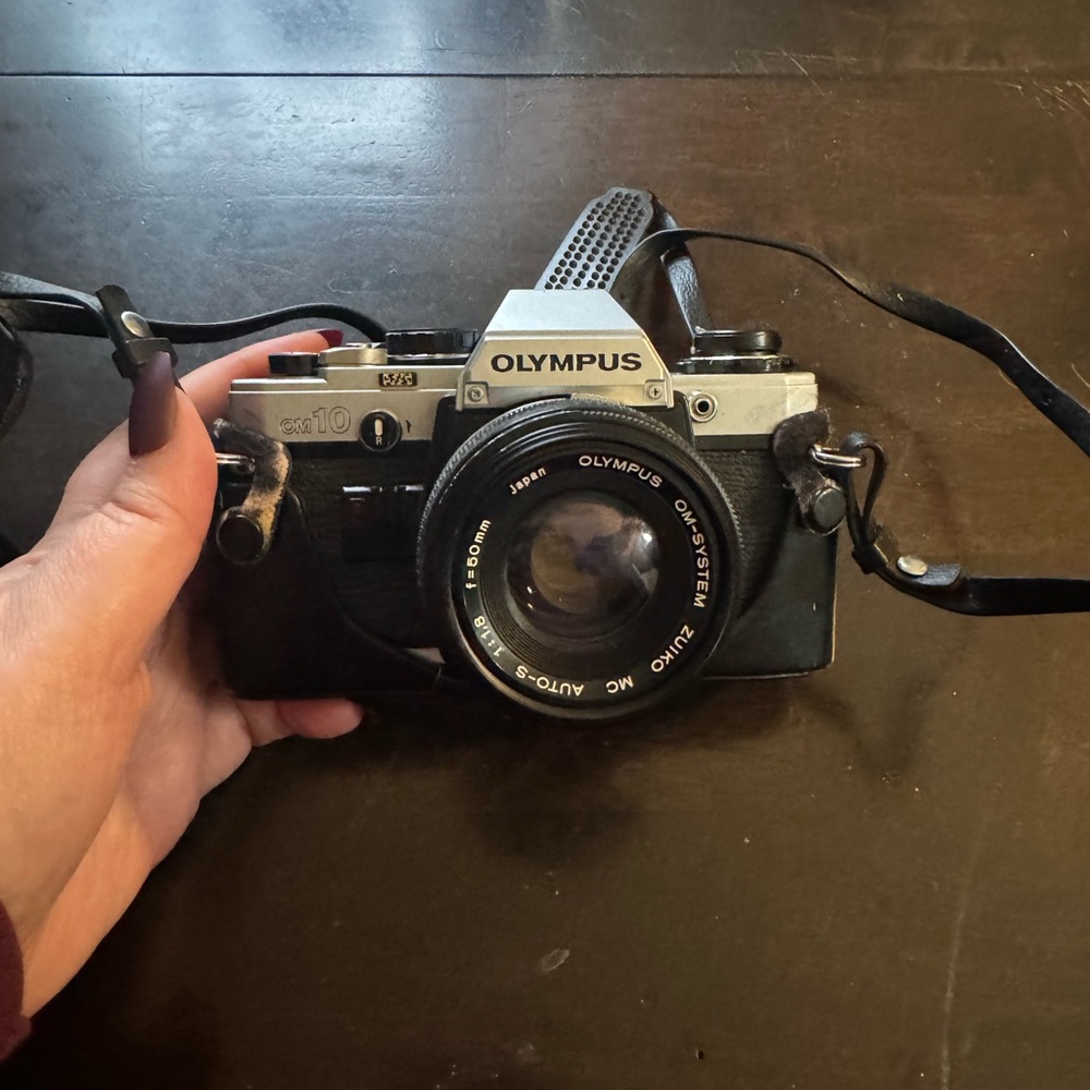 Olympus Classic Black and Silver Camera